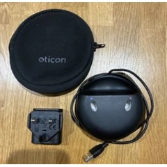 • Oticon Charger 1.0 miniRITE R Hearing Aid Charger • Carry Pouch • Plug •